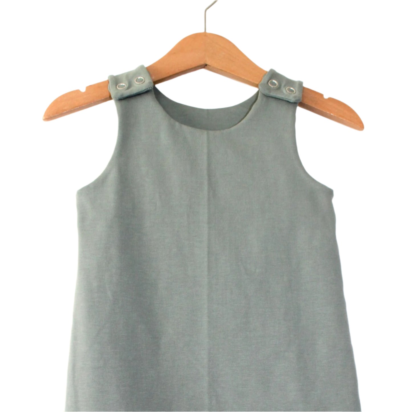 detail of a dusty mint plain jersey baby harem romper, displayed on a hanger, against a white background