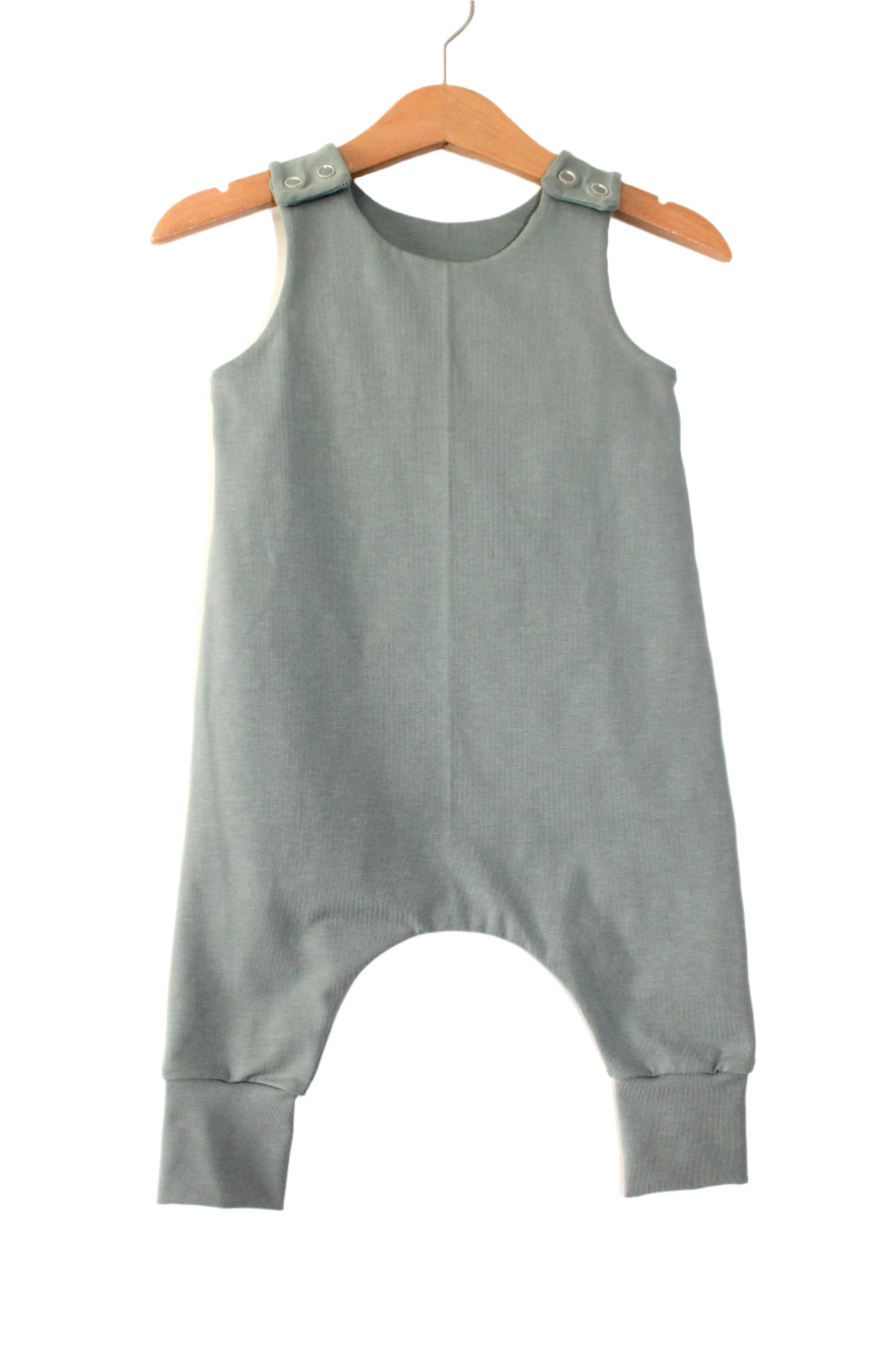dusty mint plain jersey baby harem romper, displayed on a hanger, against a white background