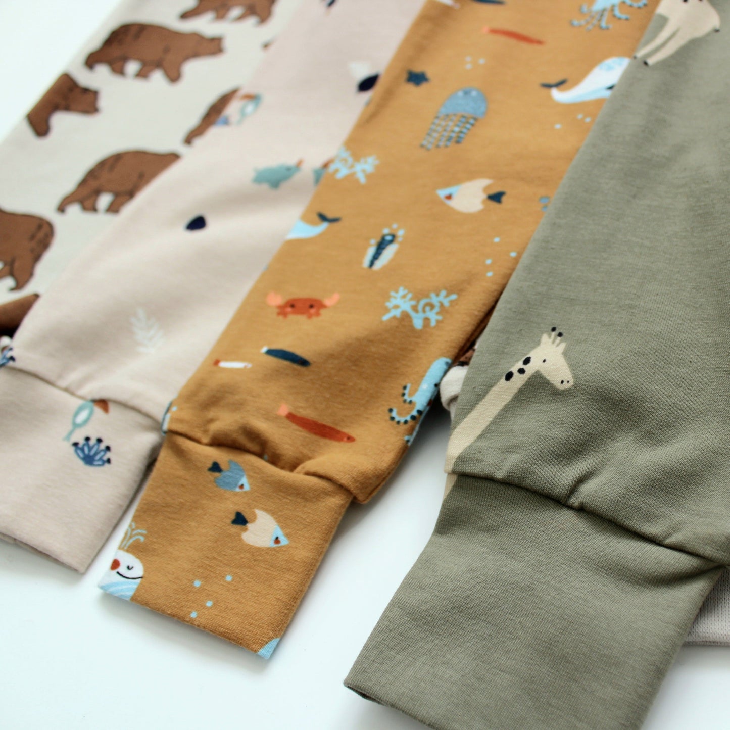 Close up view of a selection of khudu kids baby leggings