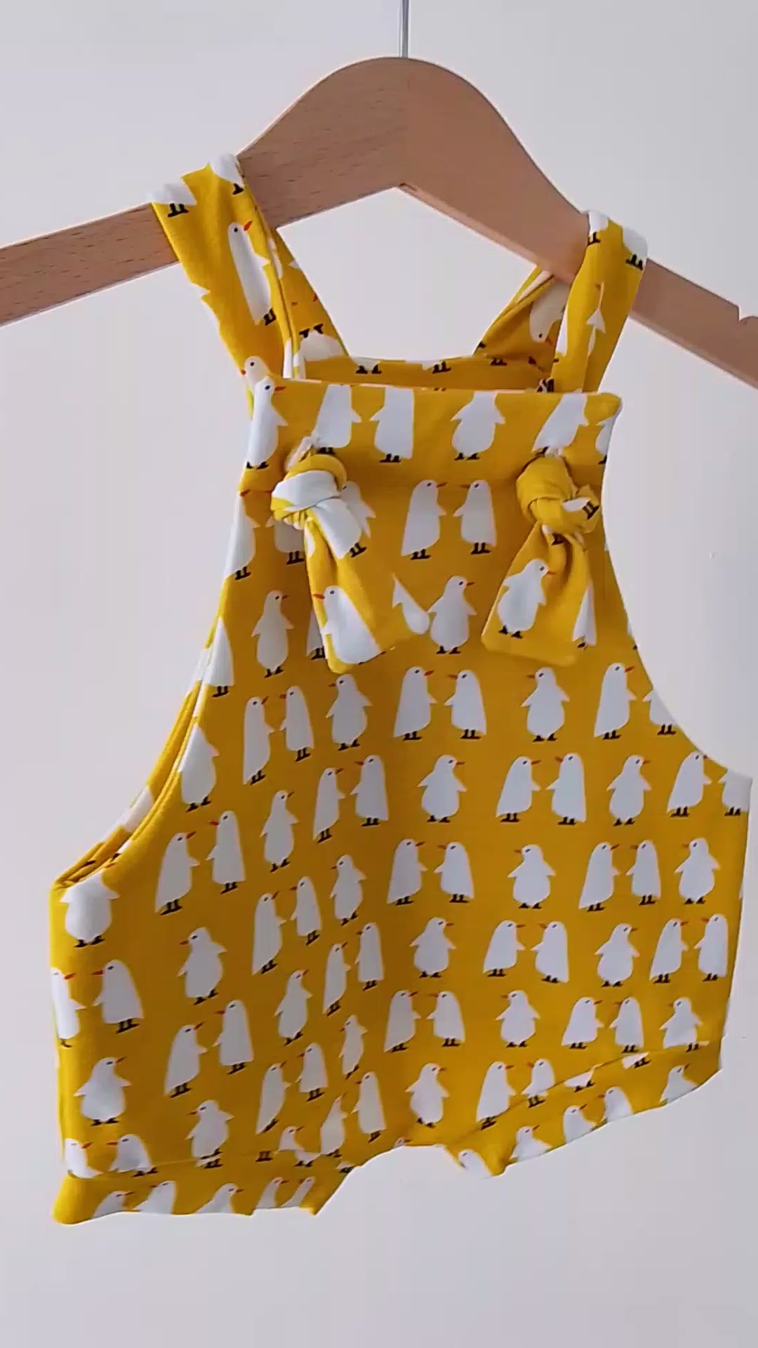 Mustard yellow baby romper video