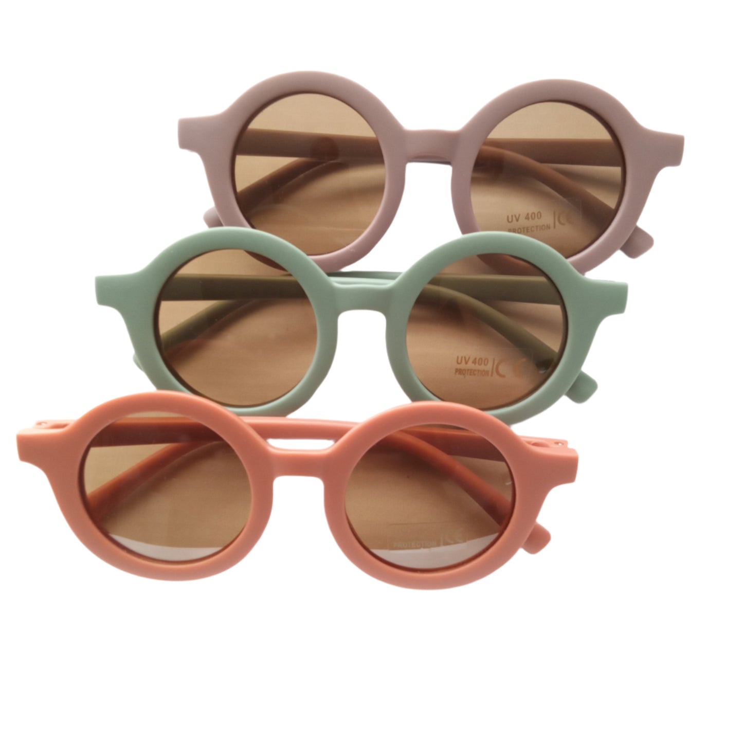 still life of retro style kids sunglasses with brightly-coloured round frames, on a white background