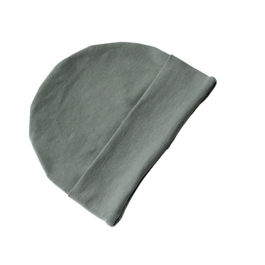 still life image of a plain light khaki kids beanie hat, on a white background